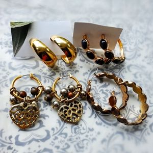 Earrings. 4 lot. Modern. Hoops.